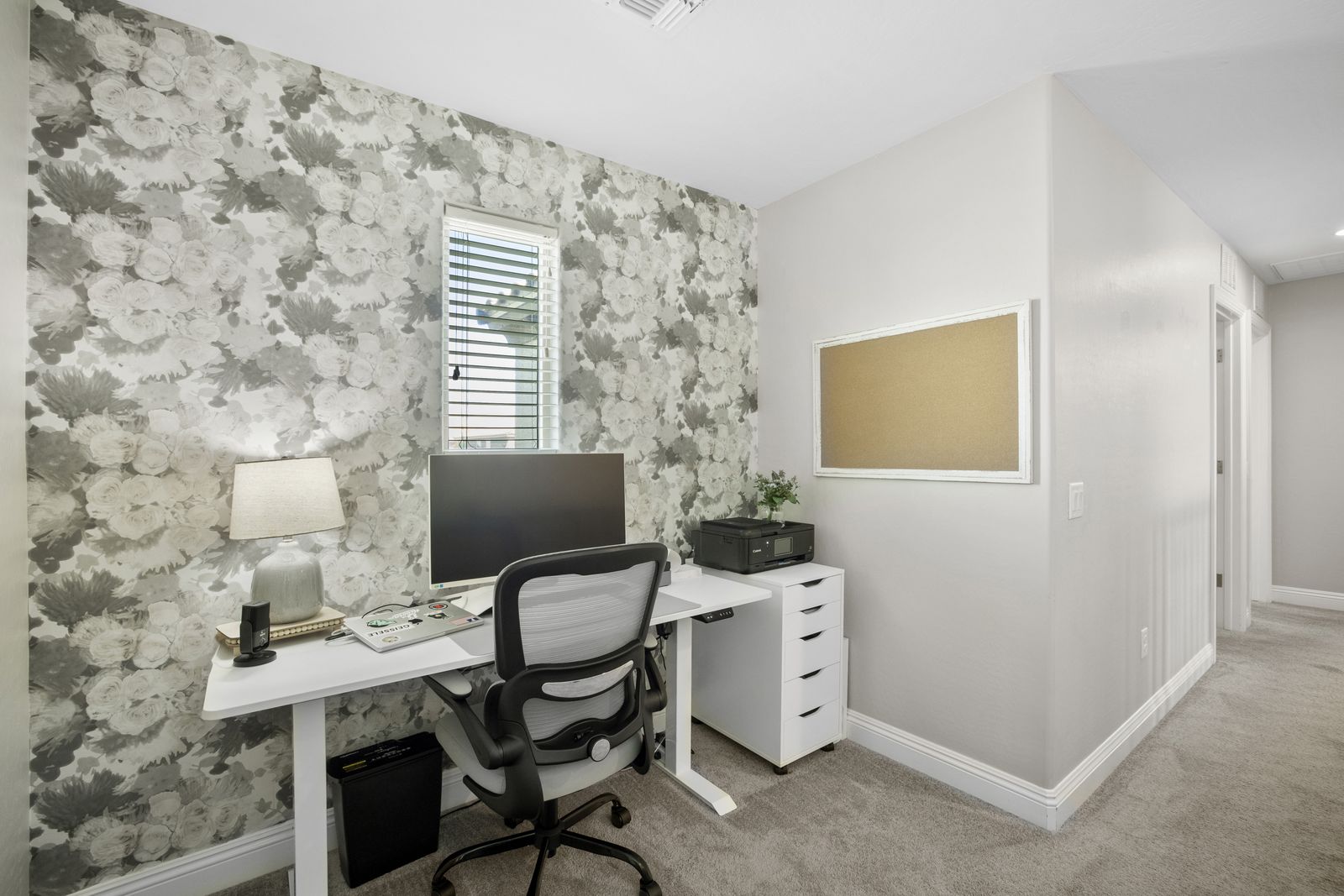 The office is open to the hall. It is not a fourth bedroom.