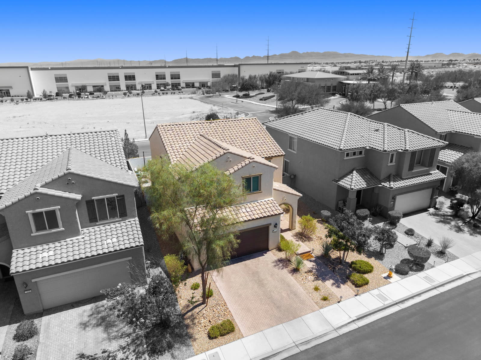 From above the street. The medical campus sits across the open ground behind the house.