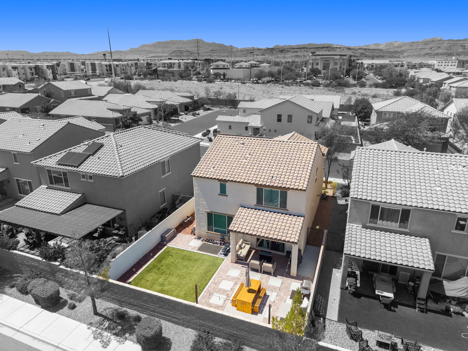 Rear view toward the mountains. The finished yard, and the 215 corridor beyond.